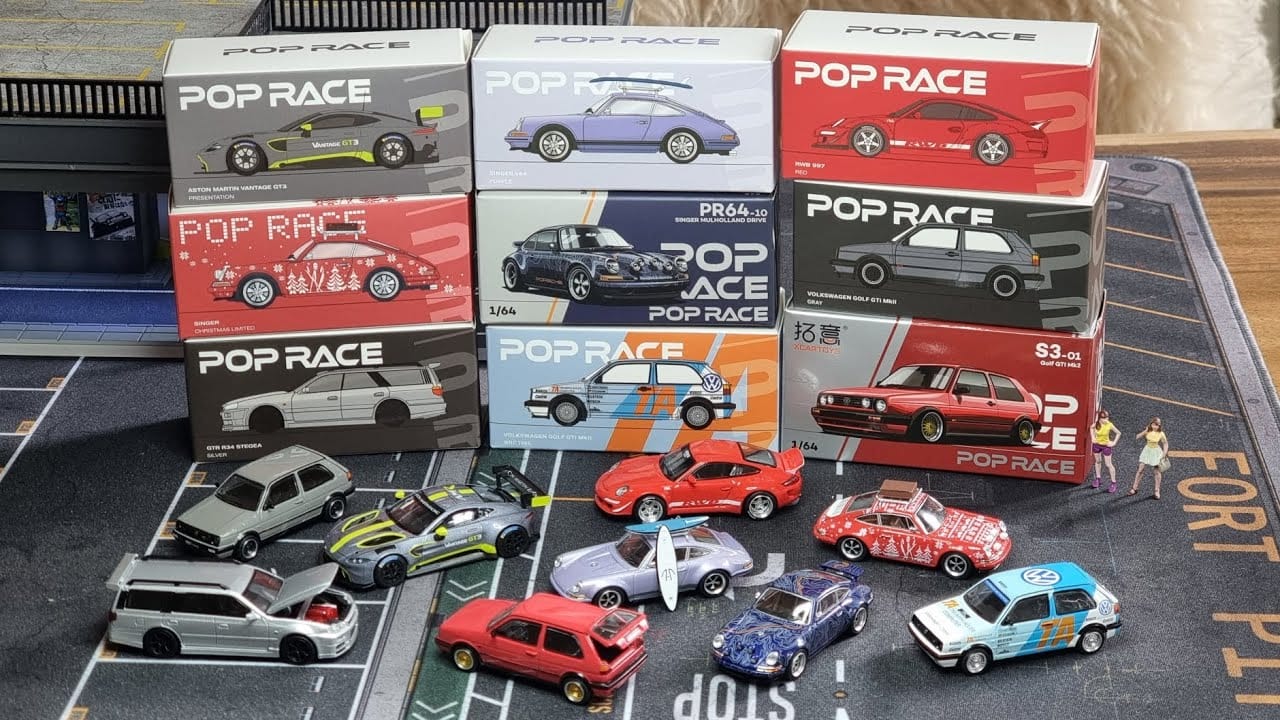 Pop Race 1:64 die-cast cars and packaging boxes displayed